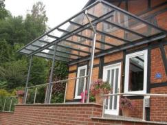 Glas-Vordach mit Gestell in anthrazit